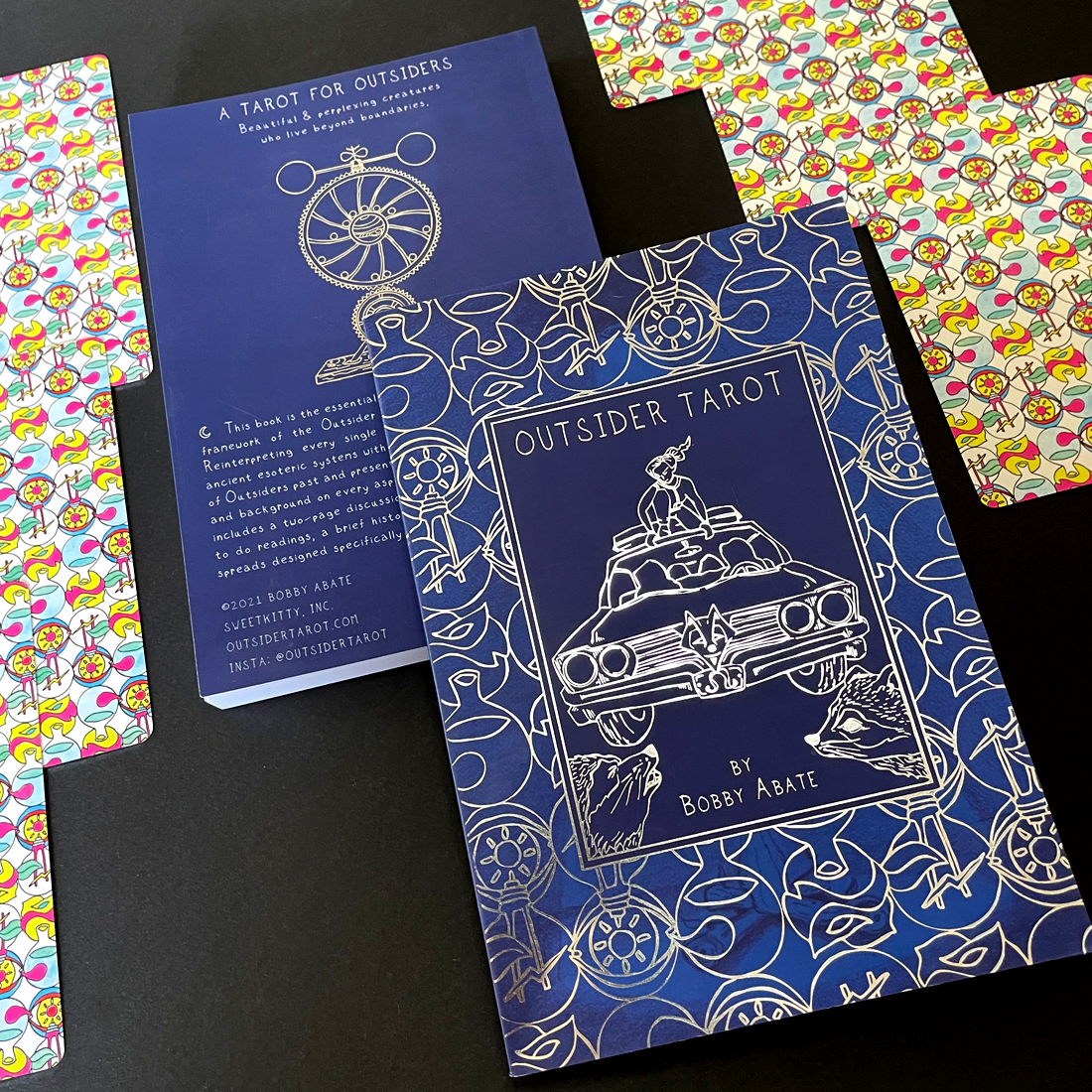 Outsider Tarot guidebook and card backs